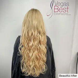 Long, wavy blonde hair extensions, back view